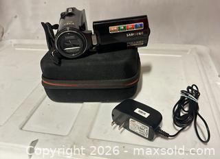 MaxSold Auction: Samsung Handheld Full HD Camcorder with Optical Zoom - Los Angeles (California, USA) SELLER MANAGED Estate Sale Online Auction -  Troost Avenue (STORAGE)