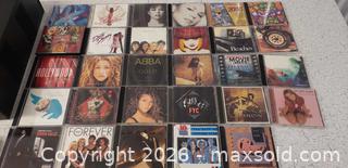 MaxSold Auction: CD Storage Rack with Large Mixed Music CD Collection – Pop, Rock & Soundtracks - Toronto (Ontario, Canada) SELLER MANAGED Downsizing Online Auction - Bridgeland (STORAGE)