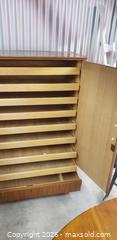 MaxSold Auction: Mid-Century Style Wood Storage Cabinet with Interior Shelving – 54”H - Toronto (Ontario, Canada) SELLER MANAGED Downsizing Online Auction - Bridgeland (STORAGE)
