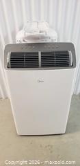 MaxSold Auction: Midea Portable Air Conditioner 12,000 BTU (14,000 ASHRAE) with Exhaust Kit - Toronto (Ontario, Canada) SELLER MANAGED Downsizing Online Auction - Bridgeland (STORAGE)