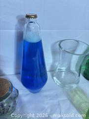 MaxSold Auction: Lot of 10+ Mixed Glassware: Vases, Drinkware & Decorative Bottles - Sunnyvale (California, USA) SELLER MANAGED Reseller Online Auction - Reseda Drive