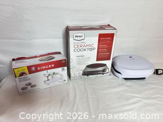 MaxSold Auction: Lot: Singer Stitch Quick+, Parini 7in Ceramic Cooktop & Brentwood Grill - Sunnyvale (California, USA) SELLER MANAGED Reseller Online Auction - Reseda Drive