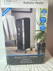 MaxSold Auction: Mainstays Electric Radiator Heater with Fan and Digital Display - Sunnyvale (California, USA) SELLER MANAGED Reseller Online Auction - Reseda Drive