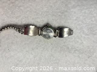 MaxSold Auction: Vintage Bulova Women's Sterling Silver Turquoise Coral Clock - Sunnyvale (California, USA) SELLER MANAGED Reseller Online Auction - Reseda Drive