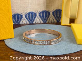 MaxSold Auction: SWAROVSKI 'Ethic' Narrow Bangle - Hamilton (Ontario, Canada) SELLER MANAGED Estate Sale Online Auction - Gertrude Street
