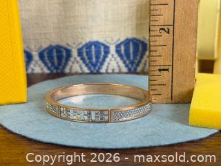 MaxSold Auction: SWAROVSKI 'Ethic' Narrow Bangle - Hamilton (Ontario, Canada) SELLER MANAGED Estate Sale Online Auction - Gertrude Street