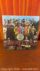 MaxSold Auction: The Beatles Sgt. Pepper's Lonely Hearts Club Band Vinyl LP - Hamilton (Ontario, Canada) SELLER MANAGED Estate Sale Online Auction - Gertrude Street