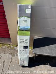 MaxSold Auction: Blue Pop-up Sun Shelter 8 x 10 - Decatur (Georgia, USA) SELLER MANAGED Reseller Online Auction - North Druid Hills Road (STORAGE)