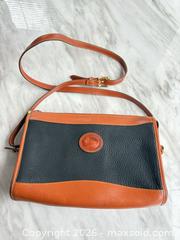 MaxSold Auction: Dooney & Bourke Leather Zip Pouch with Gold-Tone Hardware - Decatur (Georgia, USA) SELLER MANAGED Reseller Online Auction - North Druid Hills Road (STORAGE)