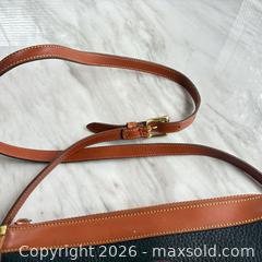 MaxSold Auction: Dooney & Bourke Leather Zip Pouch with Gold-Tone Hardware - Decatur (Georgia, USA) SELLER MANAGED Reseller Online Auction - North Druid Hills Road (STORAGE)