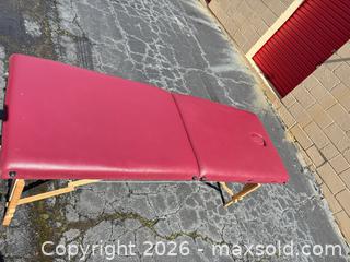 MaxSold Auction: Foldable Burgundy Massage Table with Wood Frame & Vinyl Top - Decatur (Georgia, USA) SELLER MANAGED Reseller Online Auction - North Druid Hills Road (STORAGE)