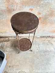 MaxSold Auction: Vintage Ornate Metal 2-Tier Stand, ~32 in (81 cm) H - Decatur (Georgia, USA) SELLER MANAGED Reseller Online Auction - North Druid Hills Road (STORAGE)
