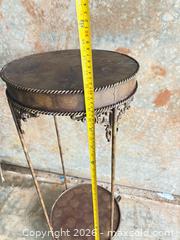 MaxSold Auction: Vintage Ornate Metal 2-Tier Stand, ~32 in (81 cm) H - Decatur (Georgia, USA) SELLER MANAGED Reseller Online Auction - North Druid Hills Road (STORAGE)