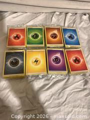 MaxSold Auction: Pokémon Trading Cards — Energy - 8 Sealed Packs (English) - Toronto (Ontario, Canada) SELLER MANAGED Downsizing Online Auction -  Rutherford Avenue