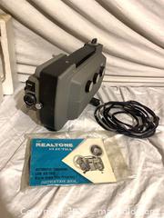 MaxSold Auction: Realtone Electra 8mm Electric Camera, Gray/Black - Toronto (Ontario, Canada) SELLER MANAGED Downsizing Online Auction -  Rutherford Avenue