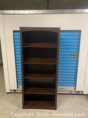 MaxSold Auction: Tall Narrow 5-Shelf Bookcase Dark Wood Finish ~70” x 32” x 12” - Vancouver (British Columbia, Canada) SELLER MANAGED Reseller Online Auction - East 7th Avenue (STORAGE)