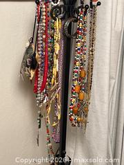 MaxSold Auction: Wrought Iron Hat Rack, Hats, Necklaces - Gilroy (California, USA) SELLER MANAGED Estate Sale Online Auction - Santa Paula Drive