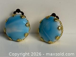 MaxSold Auction: Beautiful vintage clip-on earrings marked West Germany, featuring luminous blue art cabochons set in decorative gold-tone frames. - Campbell (California, USA) PARTNER MANAGED Estate Sale Online Auction -  Dell Avenue