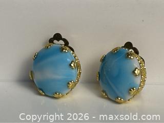 MaxSold Auction: Beautiful vintage clip-on earrings marked West Germany, featuring luminous blue art cabochons set in decorative gold-tone frames. - Campbell (California, USA) PARTNER MANAGED Estate Sale Online Auction -  Dell Avenue