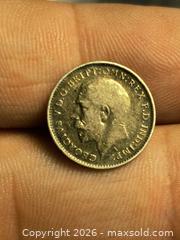 MaxSold Auction: 1915 Sterling silver 3 pence coin of England  - Kingston (Ontario, Canada) SELLER MANAGED Downsizing Online Auction - Railway Street
