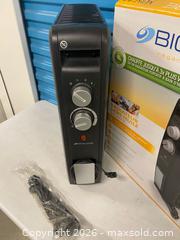 MaxSold Auction: Bionaire 1500W Oil Free Radiator Heater BOF1500-CN Portable w/ Box - Vancouver (British Columbia, Canada) SELLER MANAGED Reseller Online Auction - East 7th Avenue (STORAGE)