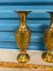 MaxSold Auction: Set of 2 decorative brass vases with engraved floral pattern. - Vancouver (British Columbia, Canada) SELLER MANAGED Reseller Online Auction - East 7th Avenue (STORAGE)