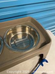 MaxSold Auction: Top Paw Raised Double Dog Bowl Stand w/ 2 Chuckit Ball Launchers & Tennis Ball - Vancouver (British Columbia, Canada) SELLER MANAGED Reseller Online Auction - East 7th Avenue (STORAGE)
