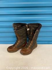 MaxSold Auction: UGG Australia Men’s Tall Winter Boots Vibram Sole Brown Size 12 US  - Vancouver (British Columbia, Canada) SELLER MANAGED Reseller Online Auction - East 7th Avenue (STORAGE)