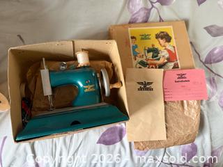MaxSold Auction: Vintage Casige Toy Sewing Machine 1940s Made in Germany  - Le Roy (New York, USA) SELLER MANAGED Estate Sale Online Auction - Wescott Road