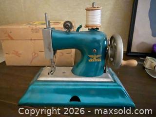 MaxSold Auction: Vintage Casige Toy Sewing Machine 1940s Made in Germany  - Le Roy (New York, USA) SELLER MANAGED Estate Sale Online Auction - Wescott Road