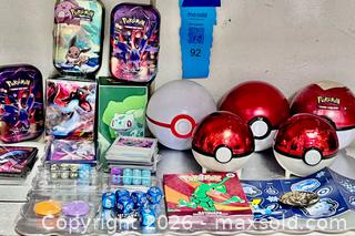 MaxSold Auction: Large Pokémon Swag Lot – Poké Balls, Tins, Sleeves, Dice, Cards & Accessories - Los Angeles (California, USA) SELLER MANAGED Downsizing Online Auction - Devonshire Street