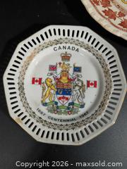 MaxSold Auction: Assorted Canadian Centennial Souvenir Plates & Cup/Saucer (Lot) - Ottawa (Ontario, Canada) SELLER MANAGED Downsizing Online Auction - Regiment Avenue