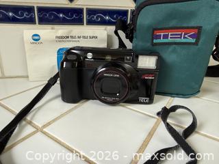 MaxSold Auction: Vintage Minolta Freedom Tele AF Multibeam 35mm Film Camera w/ Case & Manual  -  Mountain View (California, USA) SELLER MANAGED Estate Sale Online Auction - Clark Avenue