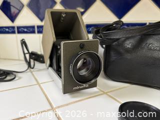 MaxSold Auction: Vintage Minolta Mini 35 Slide Projector with Original Case -  Mountain View (California, USA) SELLER MANAGED Estate Sale Online Auction - Clark Avenue