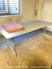 MaxSold Auction: 6 ft Gray Rectangular Work Table with Metal Legs - Longmont (Colorado, USA) PARTNER MANAGED Estate Sale Online Auction - Whitehall Drive