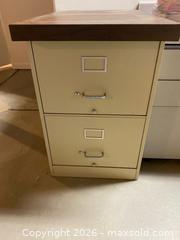 MaxSold Auction: Beige Metal & Dark Wood Top 2-Drawer Vertical File Cabinet - Longmont (Colorado, USA) PARTNER MANAGED Estate Sale Online Auction - Whitehall Drive
