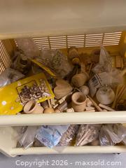 MaxSold Auction: Beige/Cream Plastic & Wood 3-Tier Rolling Cart Along with wooden crafting materials  - Longmont (Colorado, USA) PARTNER MANAGED Estate Sale Online Auction - Whitehall Drive