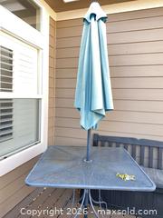 MaxSold Auction: Black Metal Square Patio Dining Set with Umbrella and 4 Chairs - Longmont (Colorado, USA) PARTNER MANAGED Estate Sale Online Auction - Whitehall Drive