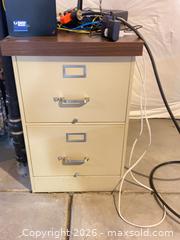 MaxSold Auction: Metal 2-Drawer Filing Cabinet with Removable Wood Top - Longmont (Colorado, USA) PARTNER MANAGED Estate Sale Online Auction - Whitehall Drive