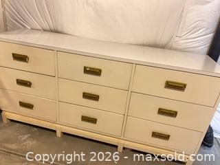 MaxSold Auction: Solid Wood 9-Drawer Off-White Dresser with Brass Recessed Pulls - Longmont (Colorado, USA) PARTNER MANAGED Estate Sale Online Auction - Whitehall Drive