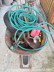 MaxSold Auction: Wheelbarrow with Assorted Garden Tools, Hose, Spare Tire, Fuel Can - Saanich (British Columbia, Canada) PARTNER MANAGED Moving Online Auction - Treetop Heights