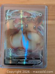 MaxSold Auction: Eevee VMAX Full Art (VMAX Ultra Rare) Trading Card - Ottawa (Ontario, Canada) SELLER MANAGED Downsizing Online Auction - Regiment Avenue