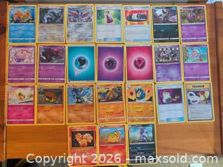 MaxSold Auction: Pokémon Trading Cards Lot — 50 Mixed Regular, Holo & Reverse Holo - Ottawa (Ontario, Canada) SELLER MANAGED Downsizing Online Auction - Regiment Avenue