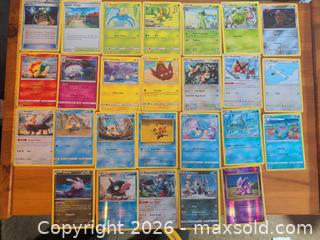 MaxSold Auction: Pokémon Trading Cards Lot — 50 Mixed Regular, Holo & Reverse Holo - Ottawa (Ontario, Canada) SELLER MANAGED Downsizing Online Auction - Regiment Avenue
