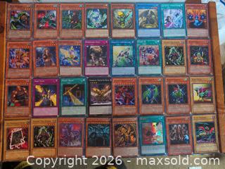 MaxSold Auction: Yu-Gi-Oh! Trading Card Lot - 32 Cards, Holographic Present - Ottawa (Ontario, Canada) SELLER MANAGED Downsizing Online Auction - Regiment Avenue