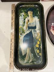 MaxSold Auction: Coca-Cola Advertising Lot: Metal Trays & Wooden Wall Sign - Warwick (Rhode Island, USA) SELLER MANAGED Reseller Online Auction - Warwick Avenue