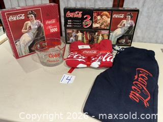 MaxSold Auction: Coca-Cola lot: puzzles, glass bowl, men's pajama set (Large), collectible - Warwick (Rhode Island, USA) SELLER MANAGED Reseller Online Auction - Warwick Avenue