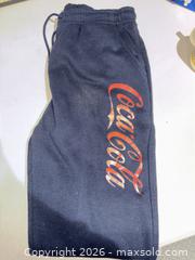 MaxSold Auction: Coca-Cola lot: puzzles, glass bowl, men's pajama set (Large), collectible - Warwick (Rhode Island, USA) SELLER MANAGED Reseller Online Auction - Warwick Avenue