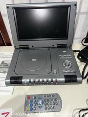 MaxSold Auction: Durabrand PDV-709 9in Portable & Set-Top DVD Player with Accessories - Warwick (Rhode Island, USA) SELLER MANAGED Reseller Online Auction - Warwick Avenue