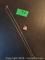 MaxSold Auction: 14k gold locket & 10k chain - Hamilton (Ontario, Canada) SELLER MANAGED Downsizing Online Auction - Cochrane Rd.